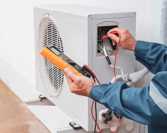 Technician diagnosing a cooling system in Ocala, FL.