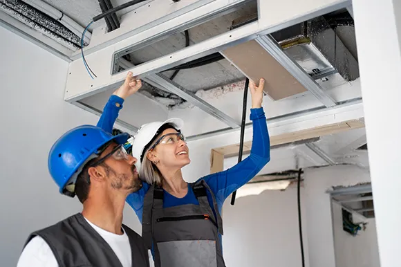HVAC technician working on an air conditioning unit, showcasing trusted cooling services in Ocala, Florida.