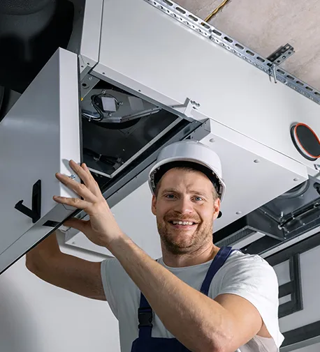 HVAC technician with equipment, emphasizing expert service and reliability.